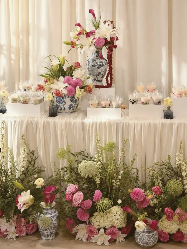 Blue-and-white porcelain dessert table — dahlias, lilies & calla