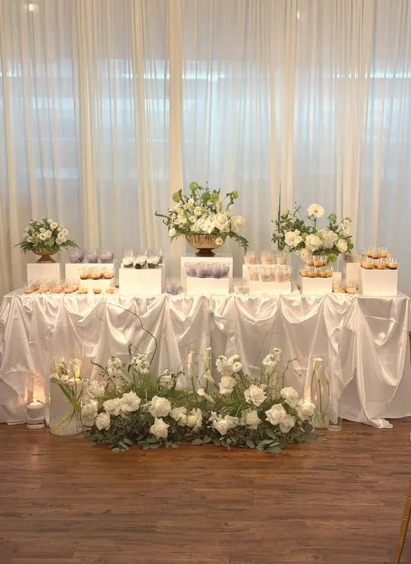 Candlelit white garden — roses, callas & stock