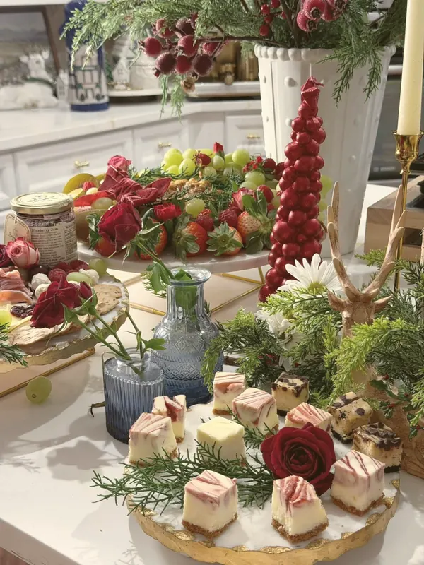 Holiday table — cheesecake bites, roses & cedar